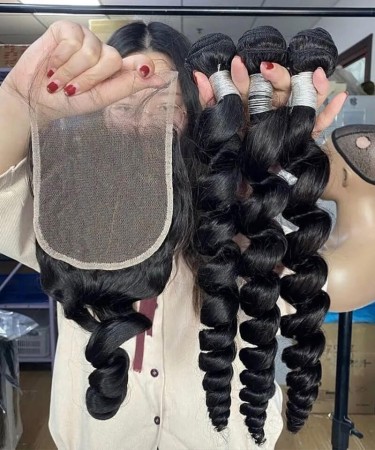 Loose Wavy Three Human Hair Bundles With 5X5 Lace Closure